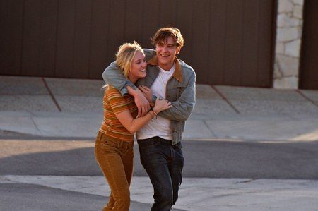 Costume design by Anette Cseri for the film The Tribes of Palos Verdes: two young people embracing in a striped sweater and denim